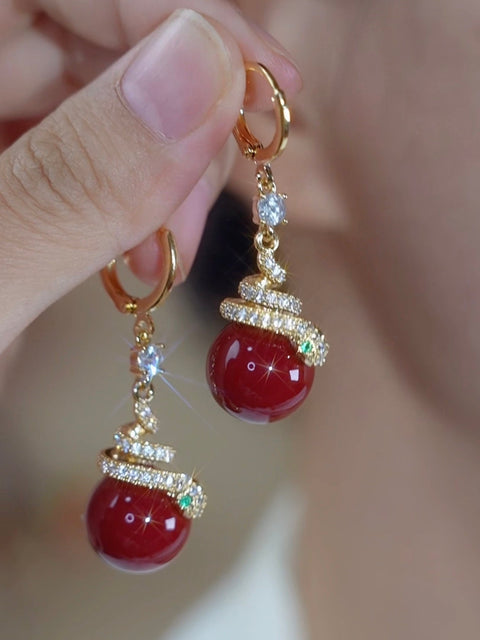 Boucles d'oreilles serpent  en perles rouges