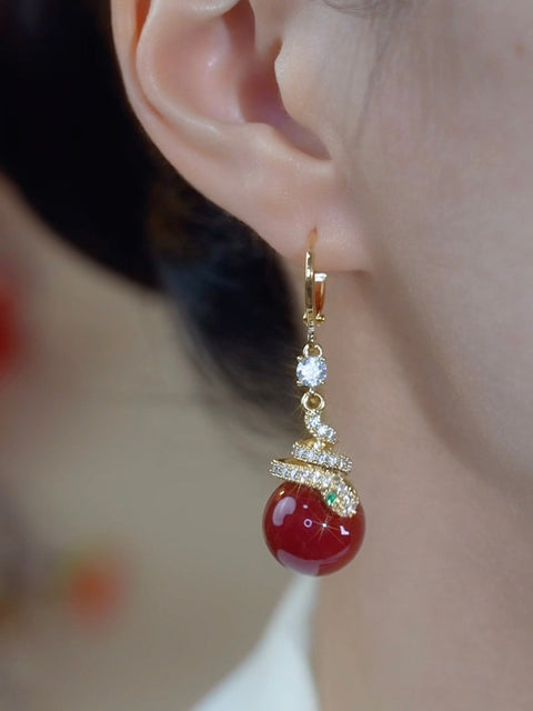 Boucles d'oreilles serpent  en perles rouges