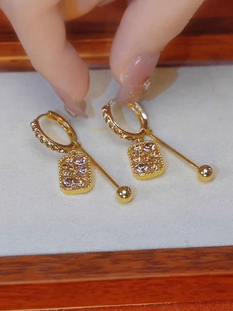 Boucle d'oreille carré en diamant