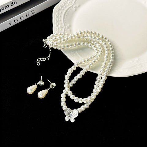 Ensemble collier et boucles d'oreilles en alliage pour femme, style bohème, en forme de larme, avec perles et fleurs