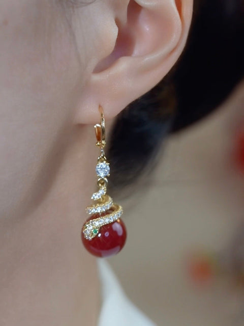 Boucles d'oreilles serpent  en perles rouges