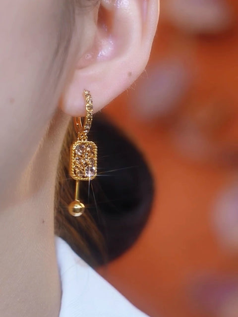 Boucle d'oreille carré en diamant