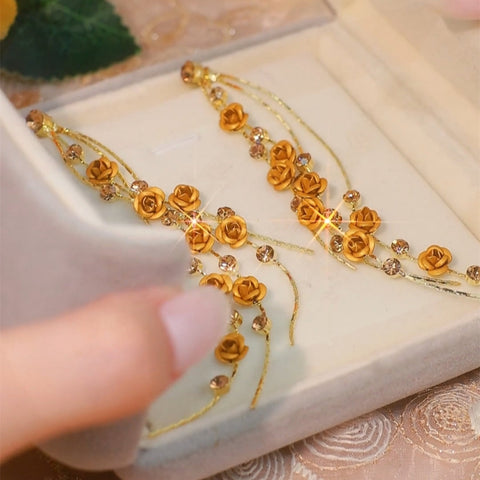 Boucles d'oreilles longues à pompons roses marron pour femmes