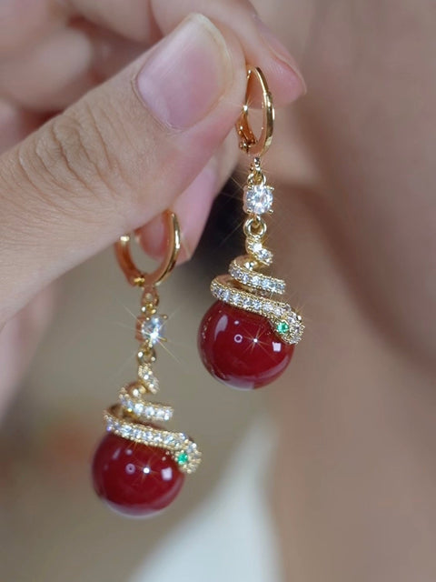 Boucles d'oreilles serpent  en perles rouges