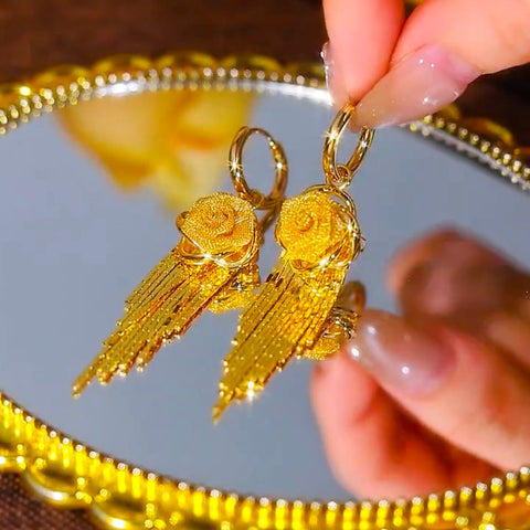 Boucles d'oreilles Fleures à pompons élégantes