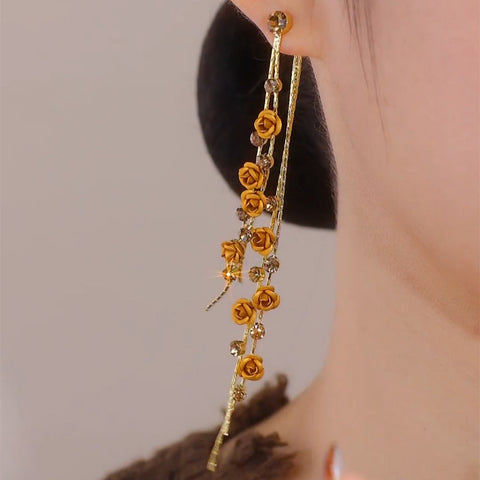 Boucles d'oreilles longues à pompons roses marron pour femmes