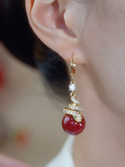 Boucles d'oreilles serpent  en perles rouges