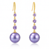 Boucles d'oreilles longues en perles violettes