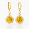 Boucles d'oreilles en forme de rose creuse dorée